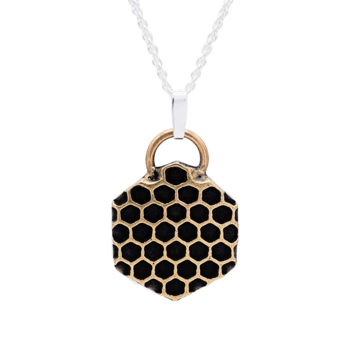 Golden honeycomb bee necklace made of bronze