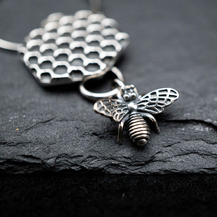 Silver honeycomb earrings with real silver bees // On the approach