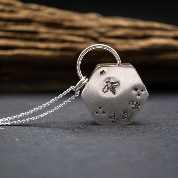 Filled honeycomb bee necklace made of real silver