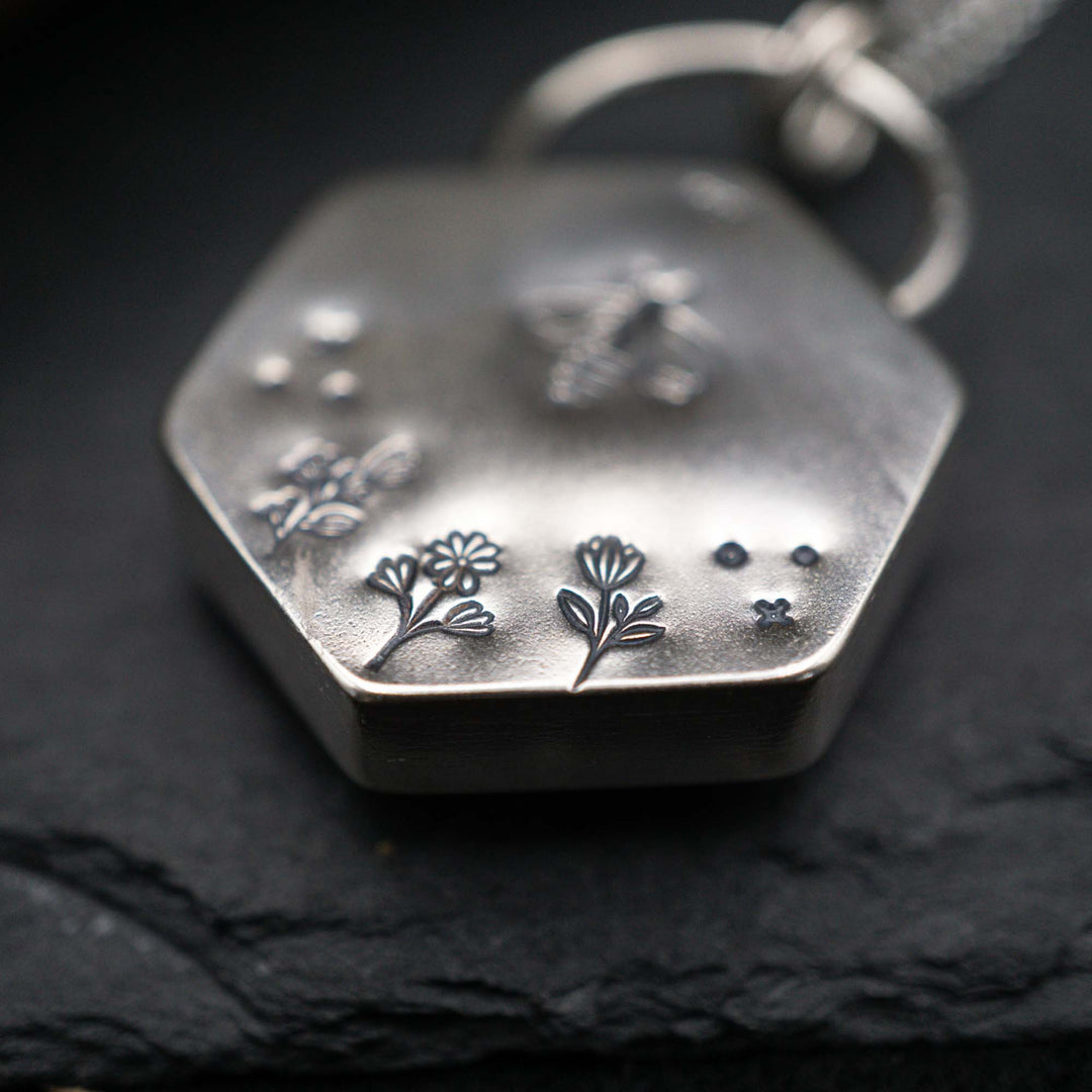 Filled honeycomb bee necklace made of real silver