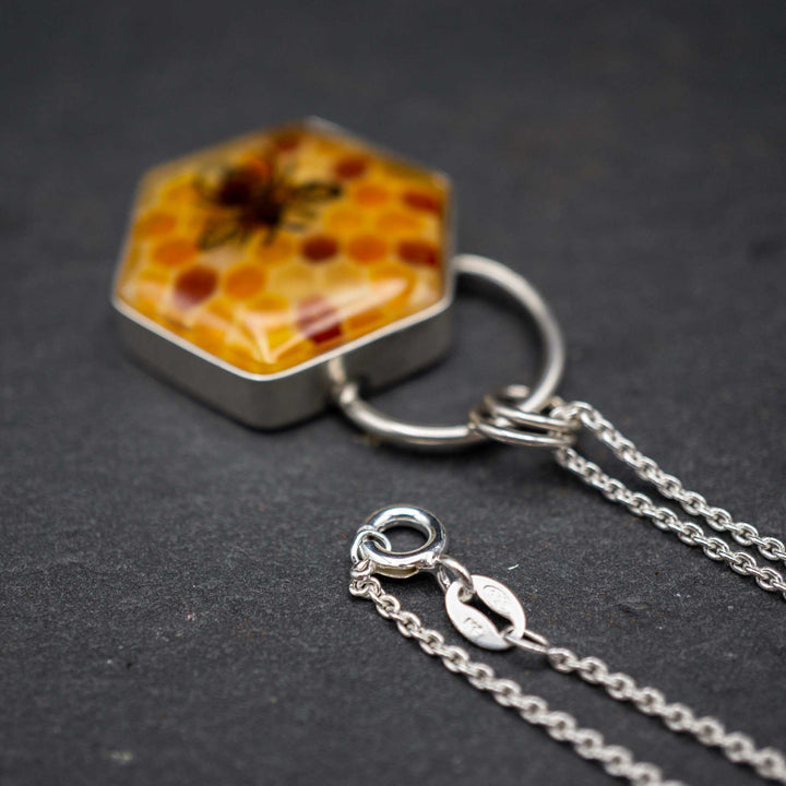 Filled honeycomb bee necklace made of real silver