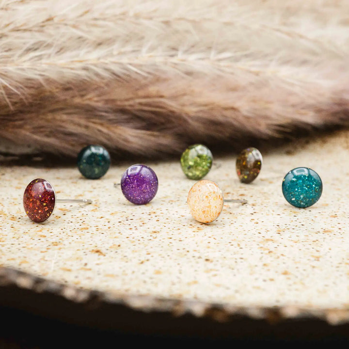 Small green glitter earrings // Galaxy stud earrings light green