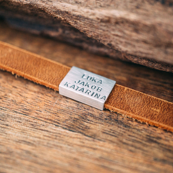 Narrow nubuck leather bracelet in cognac brown with engraving on real silver